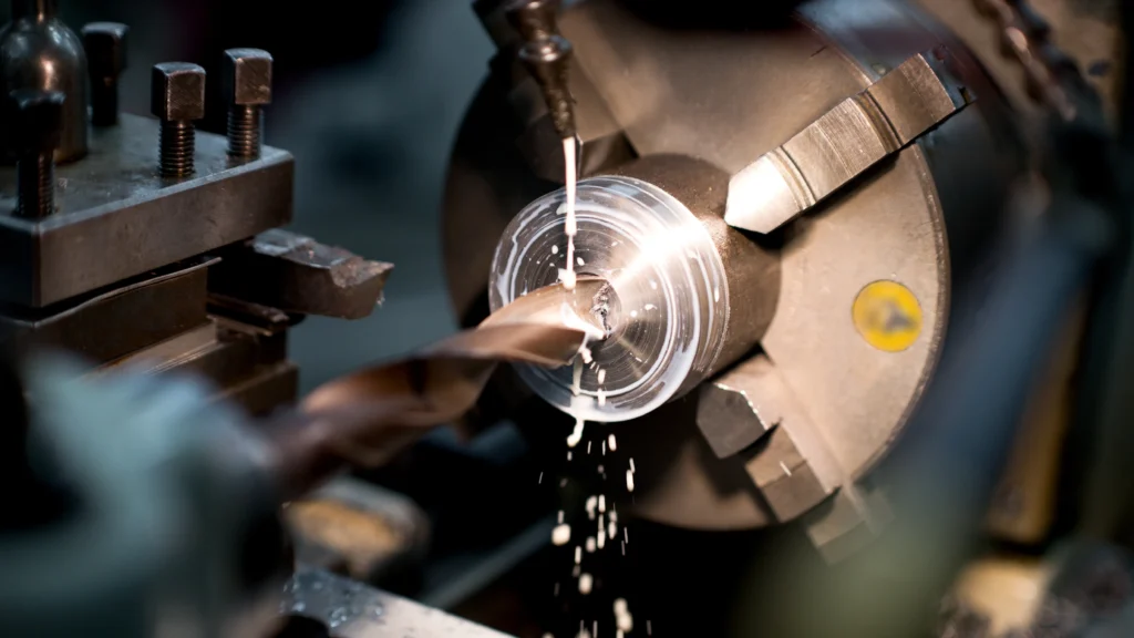 Metal Lathe Creates Metal Partswith Coolant